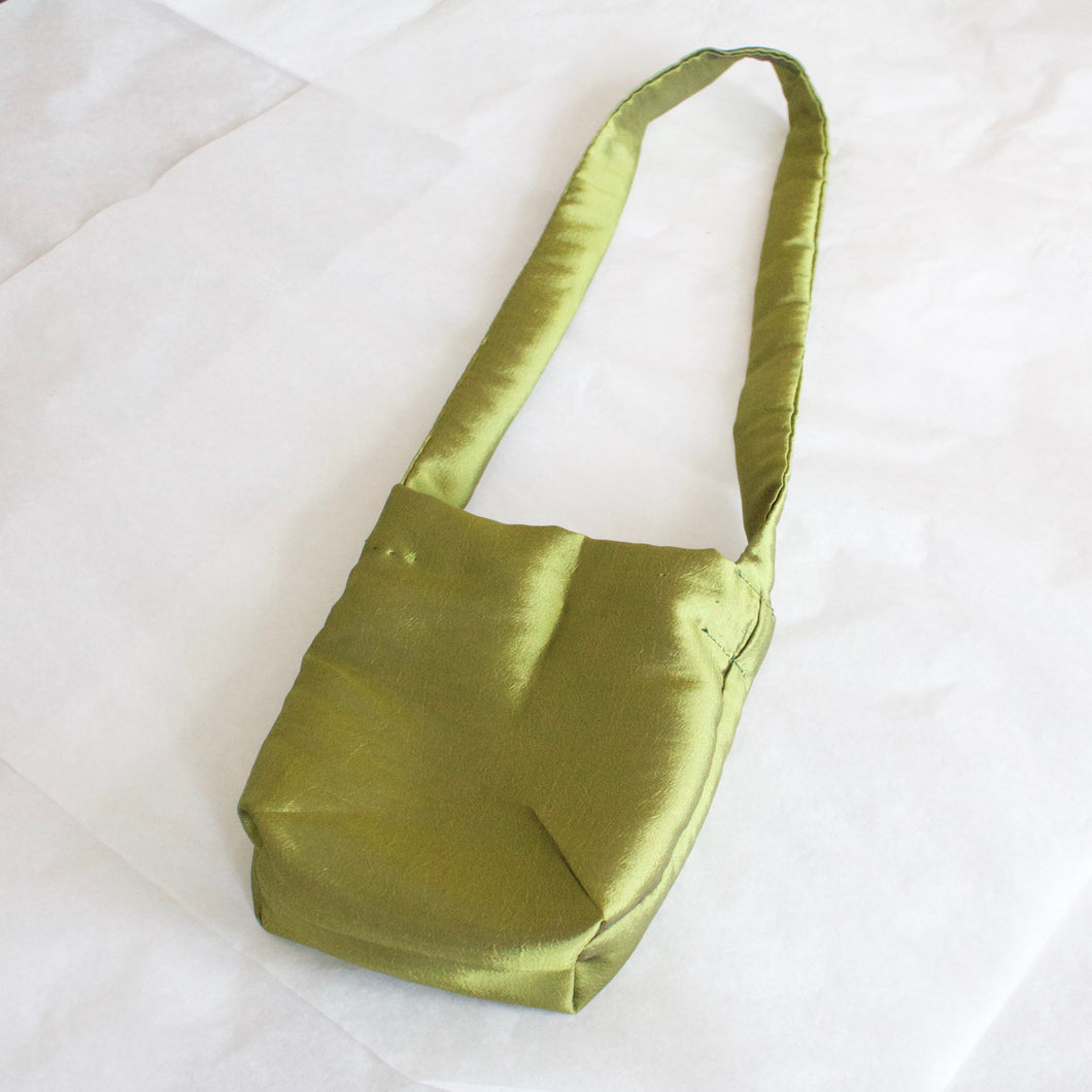 Bronwen x YV green satin pouch bag